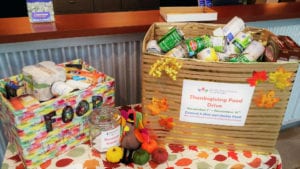 Guardian Founder, Steven Cohen, holds food drive to gather food and goods for families in need.